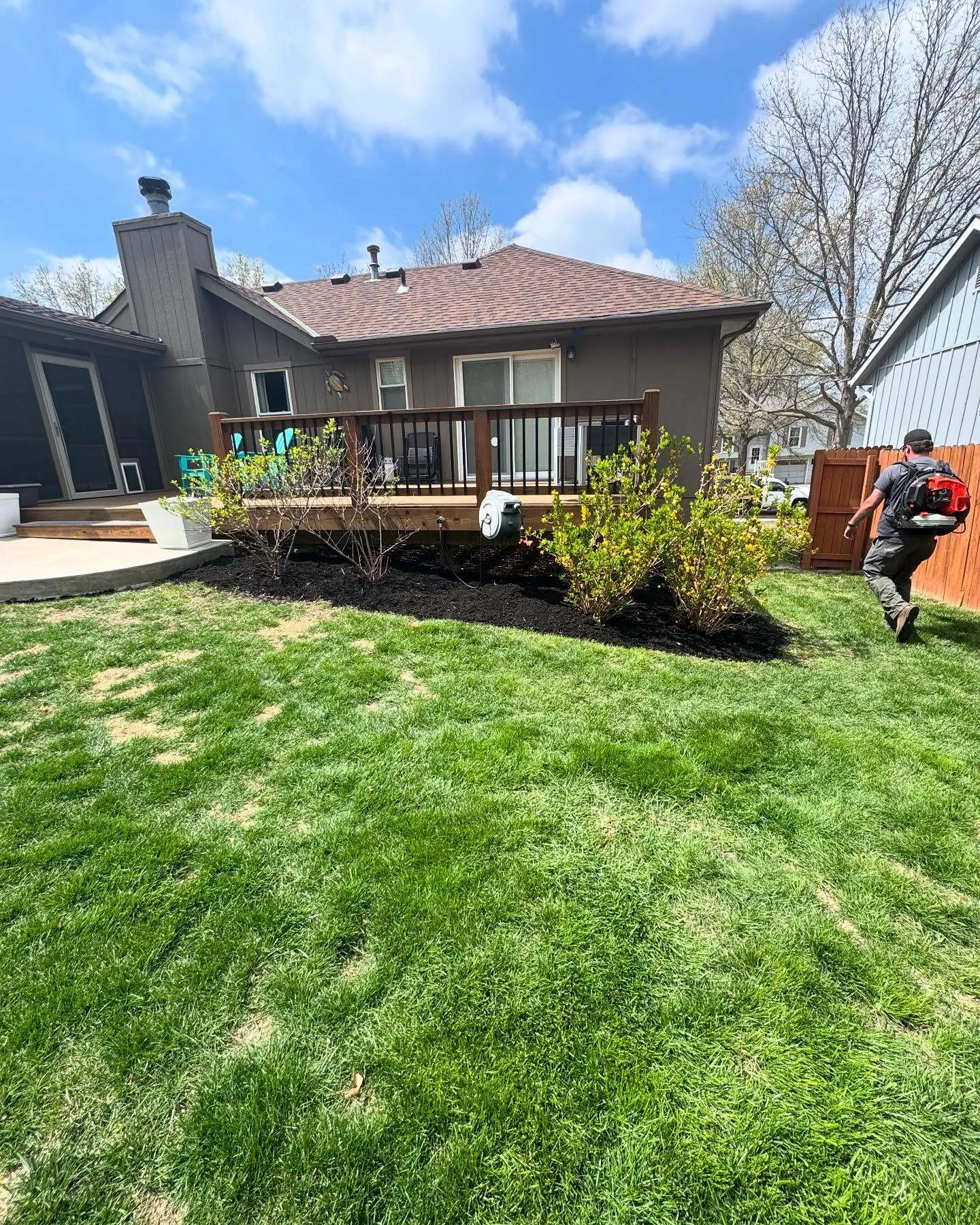 Well-maintained lawn and mulch beds by Urban Diamond in Parkville area